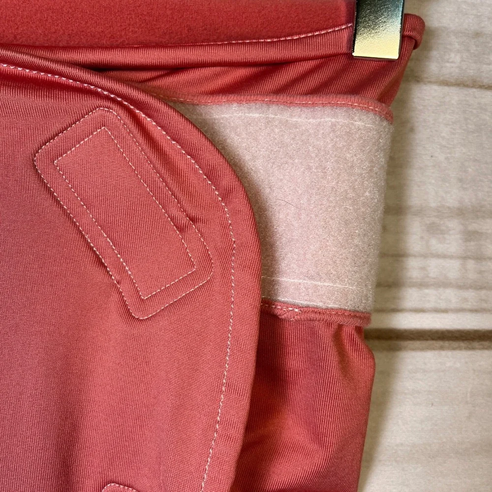 The Ollie‎ Swaddle Coral Pink Adjustable Infant Sleep Wrap